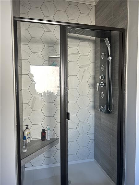 Tiled shower in the master bath