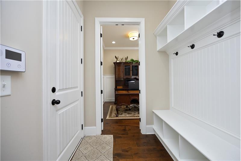 Garage Entry has Built-In Bench for Coats and Shoes