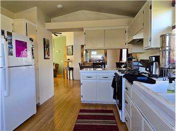 Efficient galley kitchen with great flow and a clean, modern look.