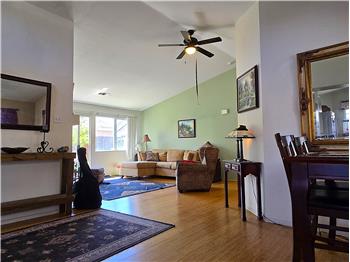 Vaulted ceilings and natural light create an airy, inviting living roomtop buyer priority.