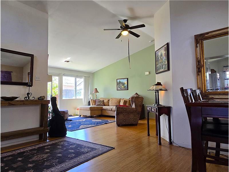 Vaulted ceilings and natural light create an airy, inviting living roomtop buyer priority.