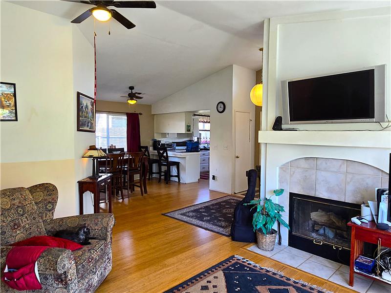 Ceiling fans and gasjet fireplace provide efficient, yearround comfort.