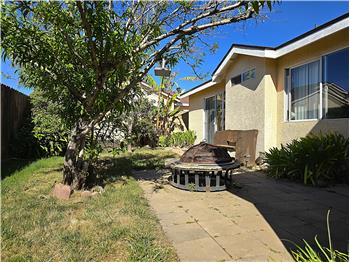 Versatile patio with easy indooroutdoor flow for morning coffee or gatherings.