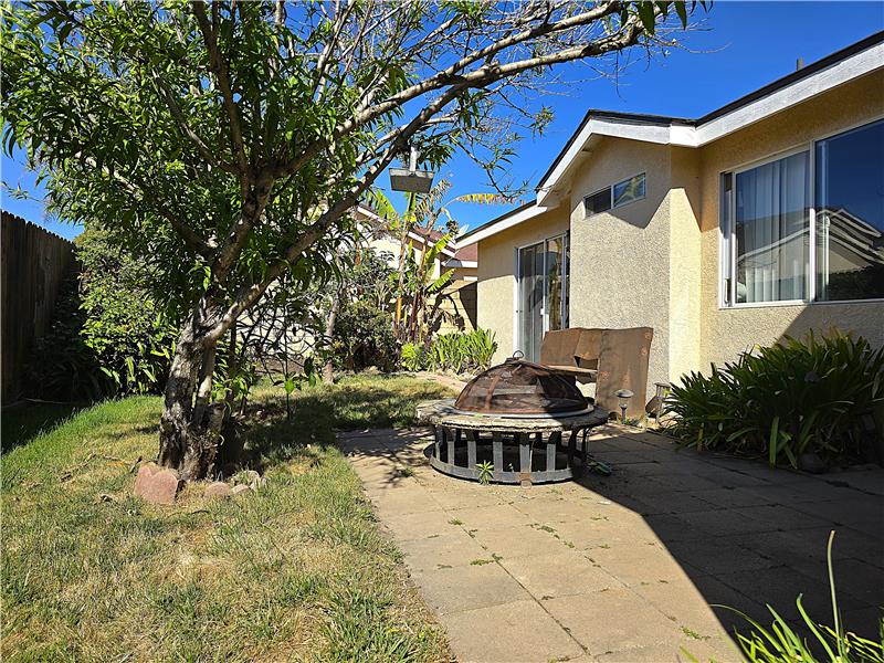 Versatile patio with easy indooroutdoor flow for morning coffee or gatherings.