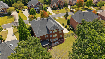 Aerial view of back of home puts the size of the .4 acre homesite in perspective.