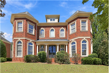Beautifully balanced, undeniably impressive. Expansive facade hints at the 5,400+ square feet and three finished levels inside.