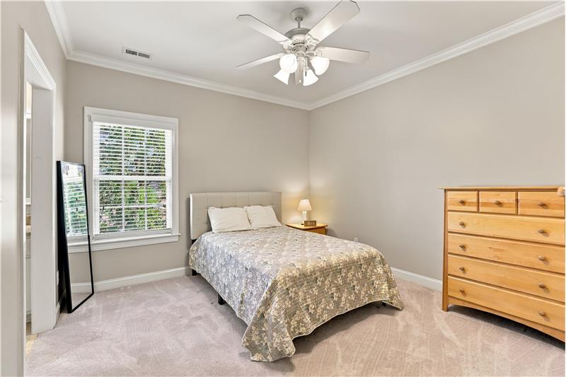 One of four additional bedrooms on the home's second floor. This one shares a Jack & Jill bath with ensuite access.