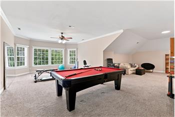 Finished third floor offers amazing flexibility to how the space in this home can be used. Currently a recreation/home gym area.