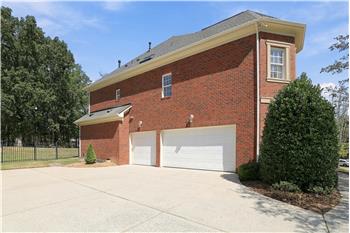 3-car side load garage provides ample room for parking and storage. Wide driveway provides additional room for parking.