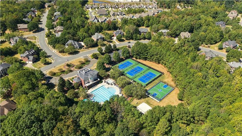 Aerial view of Weddington Chase's amenities: clubhouse, jr olympic pool tennis, basketball, volley ball courts, and more.
