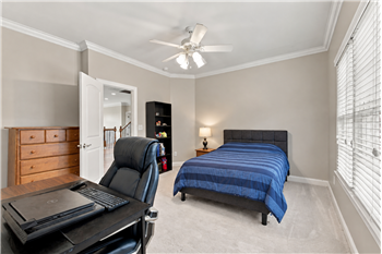 One of four additional bedrooms on the home's second floor. This one shares a Jack & Jill bath with ensuite access.