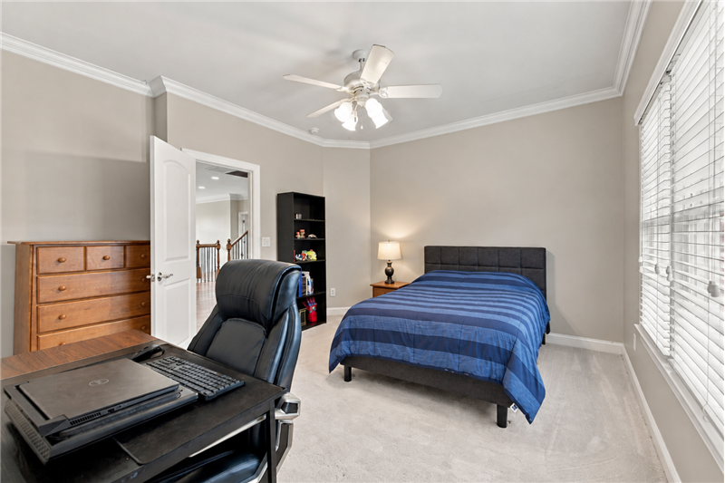 One of four additional bedrooms on the home's second floor. This one shares a Jack & Jill bath with ensuite access.
