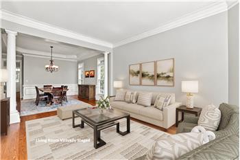 Formal does not mean closed off. Living and dining rooms flow directly into one another.