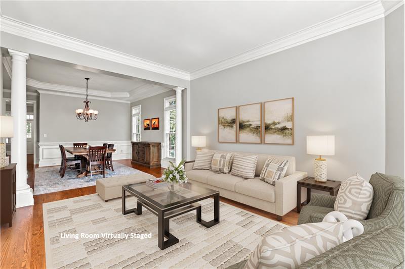 Formal does not mean closed off. Living and dining rooms flow directly into one another.