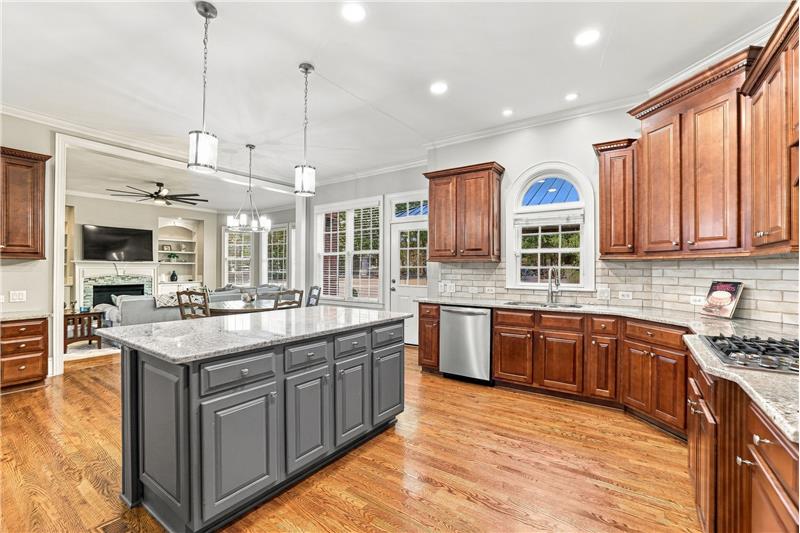 Open sight lines between the kitchen breakfast area, great room keep everyone connected.