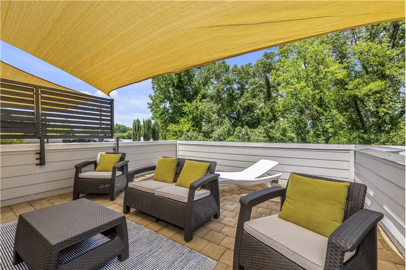 Roof top terrace provides 240 square feet of space to relax and entertain.