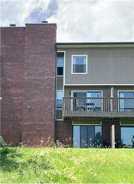 Back of townhome, viewed from greenbelt
