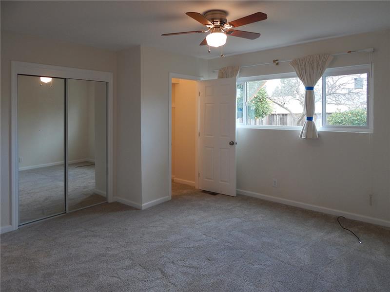 Master suite with 2 closets, 1 walkin