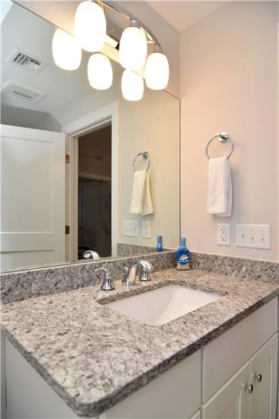 Second full granite bathroom with tub/shower