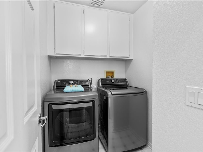 1st floor laundry room adjacent to kitchen