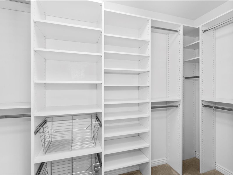 primary bedroom walk-in closet
