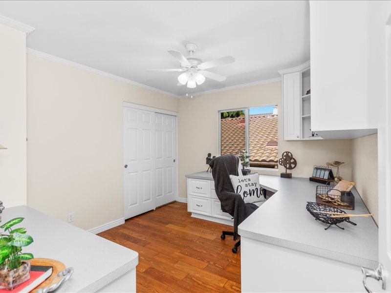 guest bedroom set up at office with built-ins