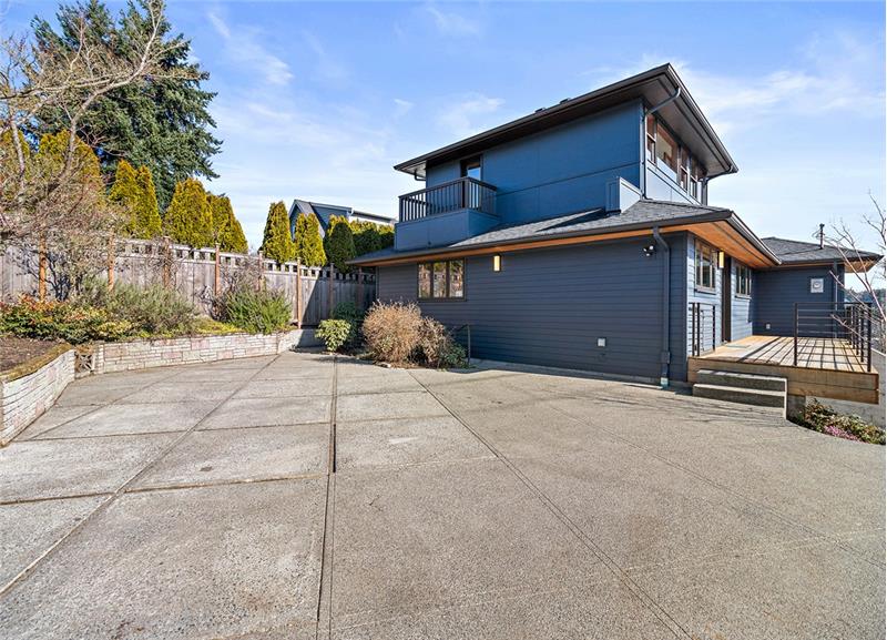 Back patio, fence it in, or use for extra parking!
