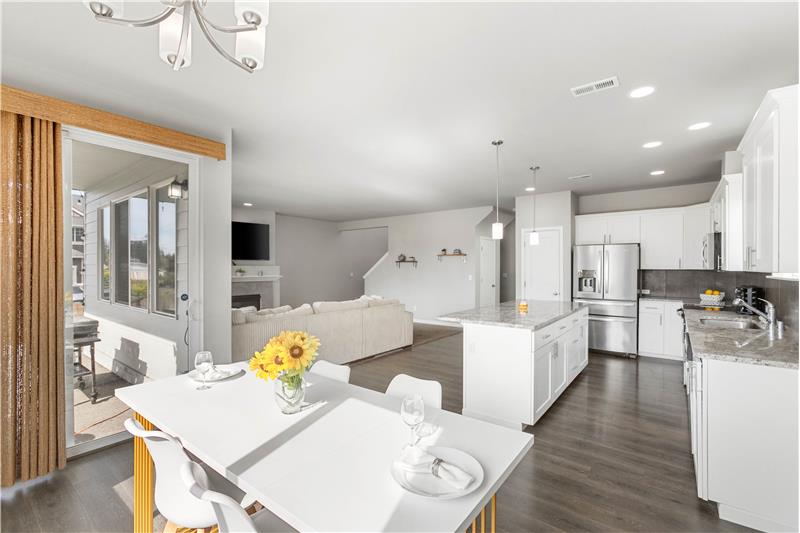 The dining area provides backyard views and natural light making this area a bright spot for everyday meals.