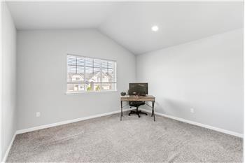 Bedroom 2 has vaulted ceilings.
