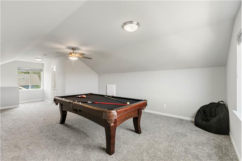 This flexible third-floor bonus space could also work as a media room, workout area, game room, or guest retreat.