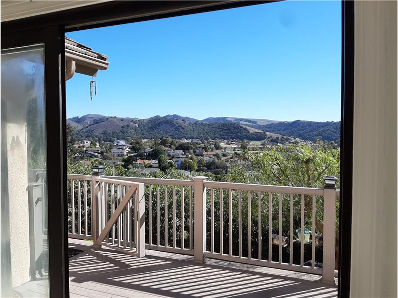 The view from the Formal Dining Room will likely consummate your decision. 