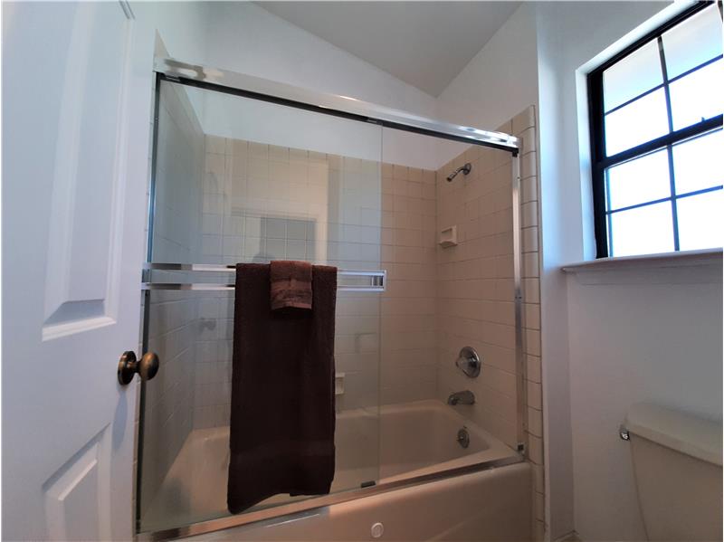 A shower/tub combo offers the new owner options.