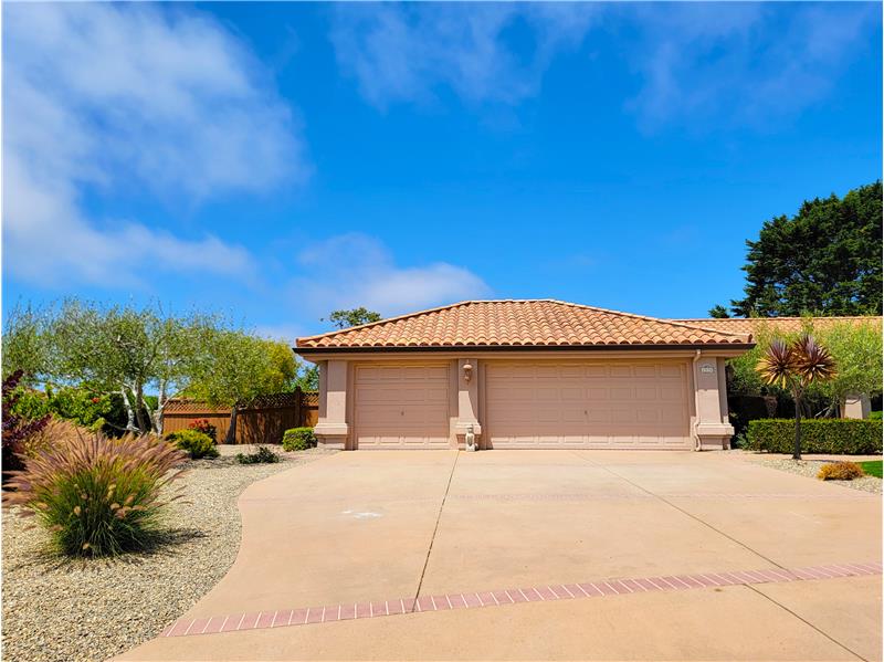 3 Car Garage w/additional Drop Down Ladder & Attic Space!