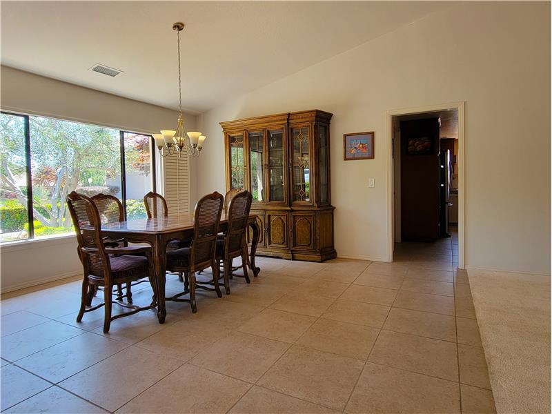 19.5 inch floor tiles can make a room look small: Not in this house! Expansive room sizes welcome your decorating ideas!