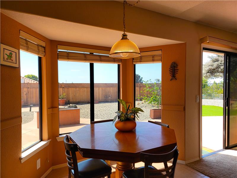 A window-adorned alcove creates a prefect spot for Informal Dining!