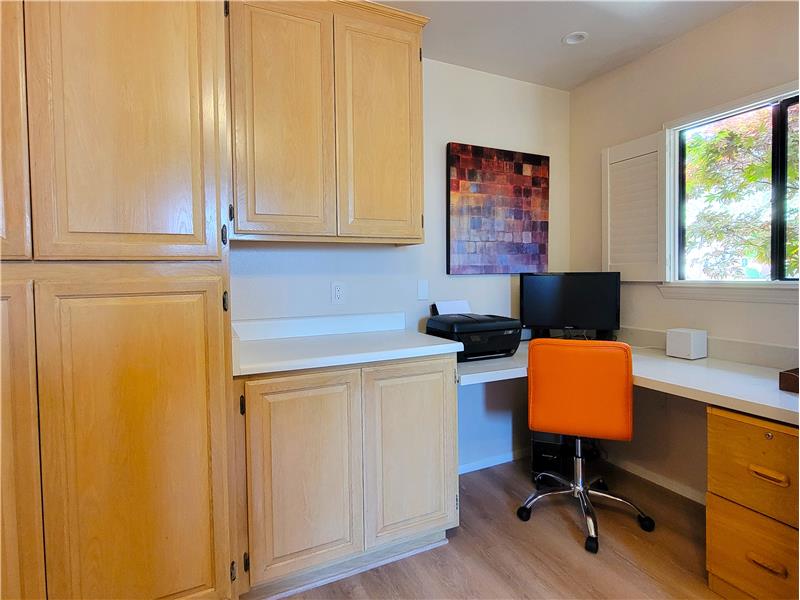 More than just a Utility Room with loads of overflow storage, an added bonus is the corner desk off the kitchen.