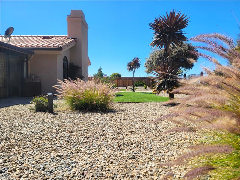 The Sunroom to the left; Center Stage is portion of .5 acre that typically would be arduous & expensive; Not so w/Bayside Place!