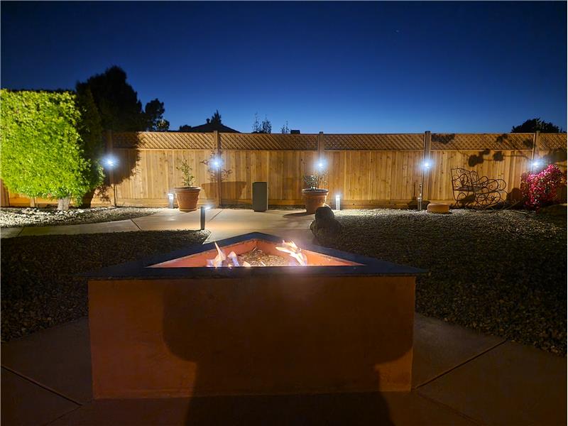 The glowing focal point of a gas assisted outdoor fireplace allows for year round enjoyment! 