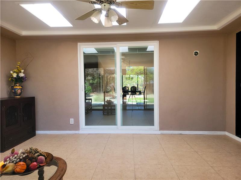 Sun Room w/ceiling fan...it's just missing a good book to read!