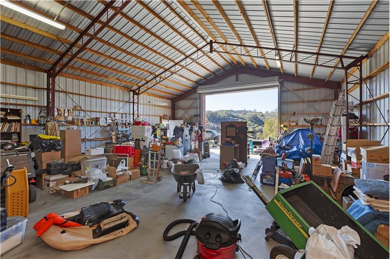 detached oversize garage with room for RV, plus storage area