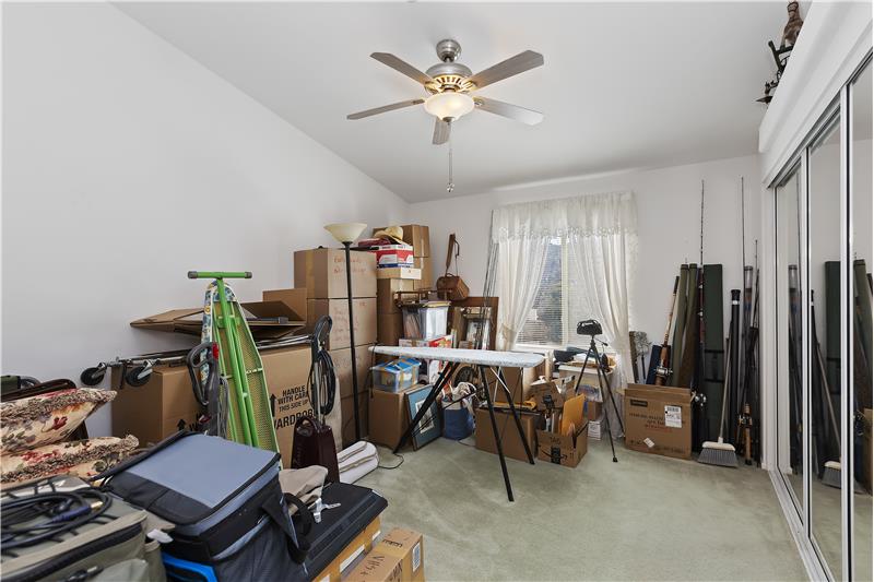 3rd bedroom being used for storage as sellers prepare to move