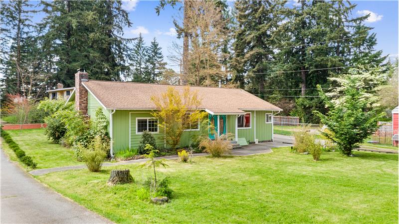 Separate driveway off the side road.