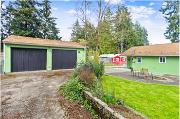 Not only is there covered parking, but both driveways together can accommodate up to 10 cars.