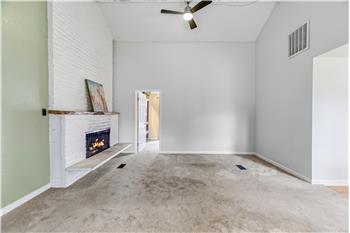 A wonderful little nook in the living room to get cozy in front of the fireplace.