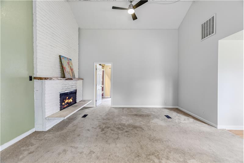 A wonderful little nook in the living room to get cozy in front of the fireplace.