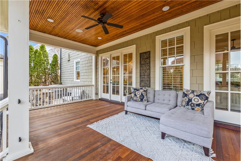 Back porch, accessed from both the great room and dining area, a natural extension of the home's living and entertaining areas.