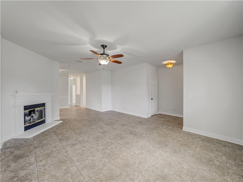 Spacious living room with easy care ceramic flooring
