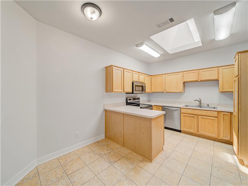 Bright and spacious kitchen with a place for breakfast table