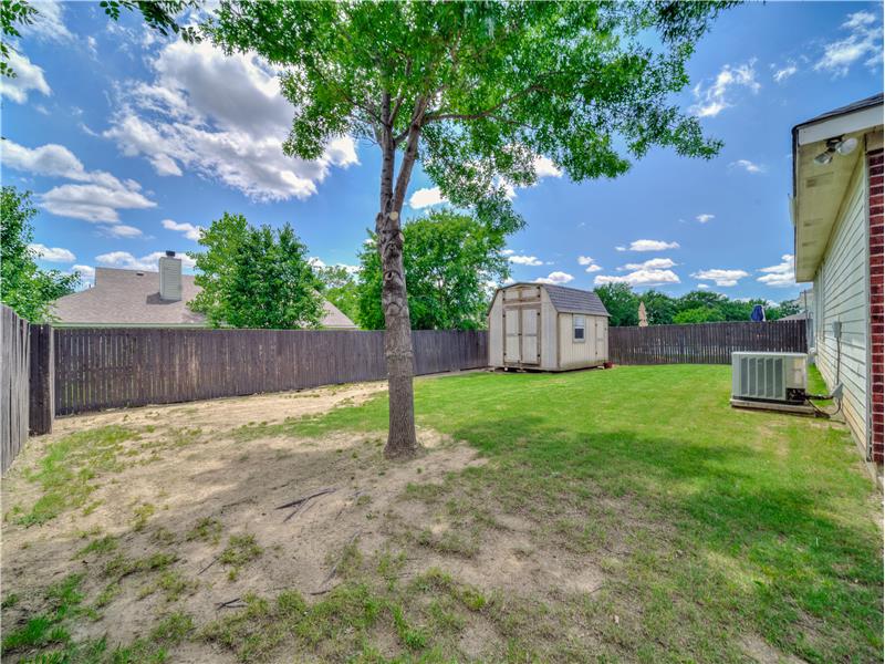 Spacious fenced back yard