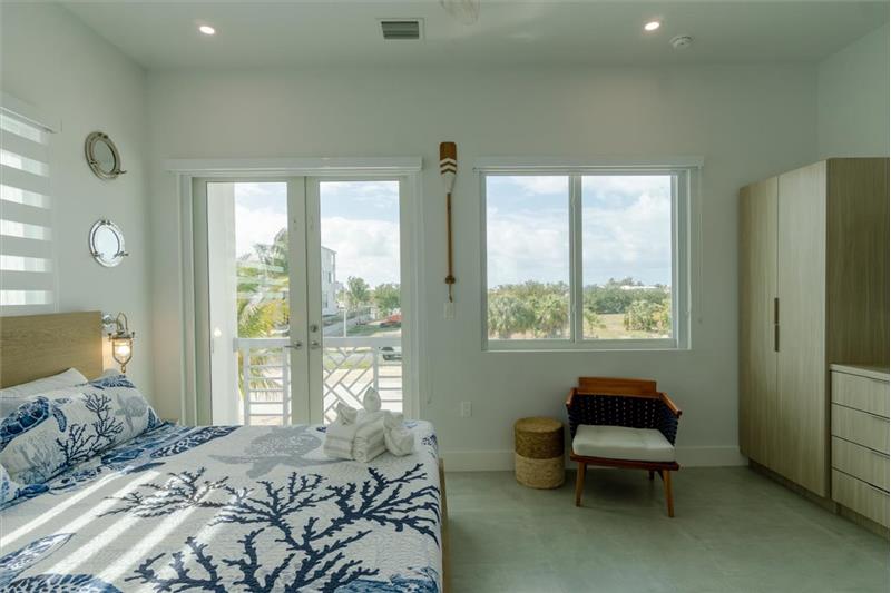 Main floor King bedroom with ensuite bathroom.